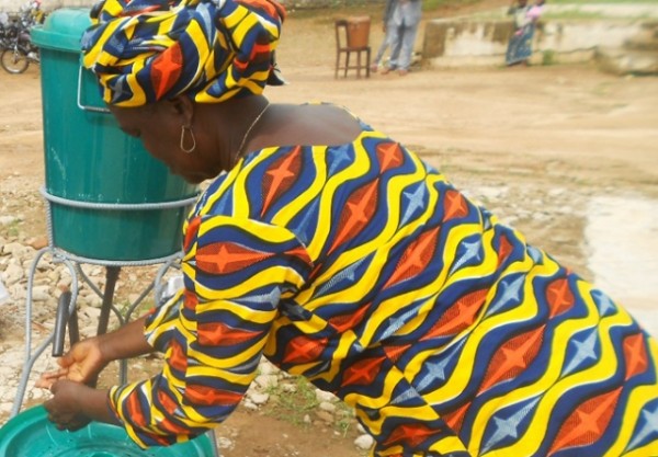In Guinea, Caritas works with other rescue groups to distribute soap, chlorine and other materials to thousands of families. Credit: Caritas